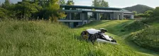 Mammotion LUBA 2 AWD 5000HX Robotic Mower — wire-free robotic mower, manufacturer photograph taken outdoors on a lawn