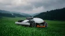 Mammotion LUBA 3 AWD 5000H Robotic Mower — wire-free robotic mower, manufacturer photograph taken outdoors on a lawn