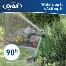 Orbit promotional graphic for the 58308 brass impact sprinkler on an adjustable tripod: the sprinkler stands in a planted border spraying a single jet, under an Orbit banner with the printed manufacturer claims 6,360 sq ft coverage and 90 ft spray diameter
